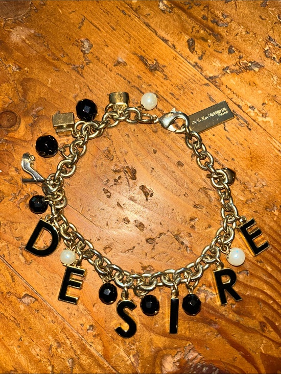 Dolce & Gabbana Jewelry - DOLCE & GABBANA Gold Charm Bracelet with Black Letter & Bead Accents - 'DESIRE'